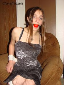 www.staciesnowbound.com - Stiletto in a sexy dress, bound and ball gagged thumbnail